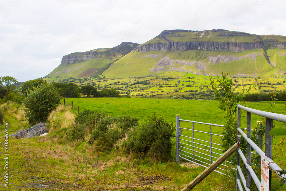 Benbulben Moutain,  a large flat-topped rock formation in County Sligo, Ireland which forms part of the Dartry Mountains.