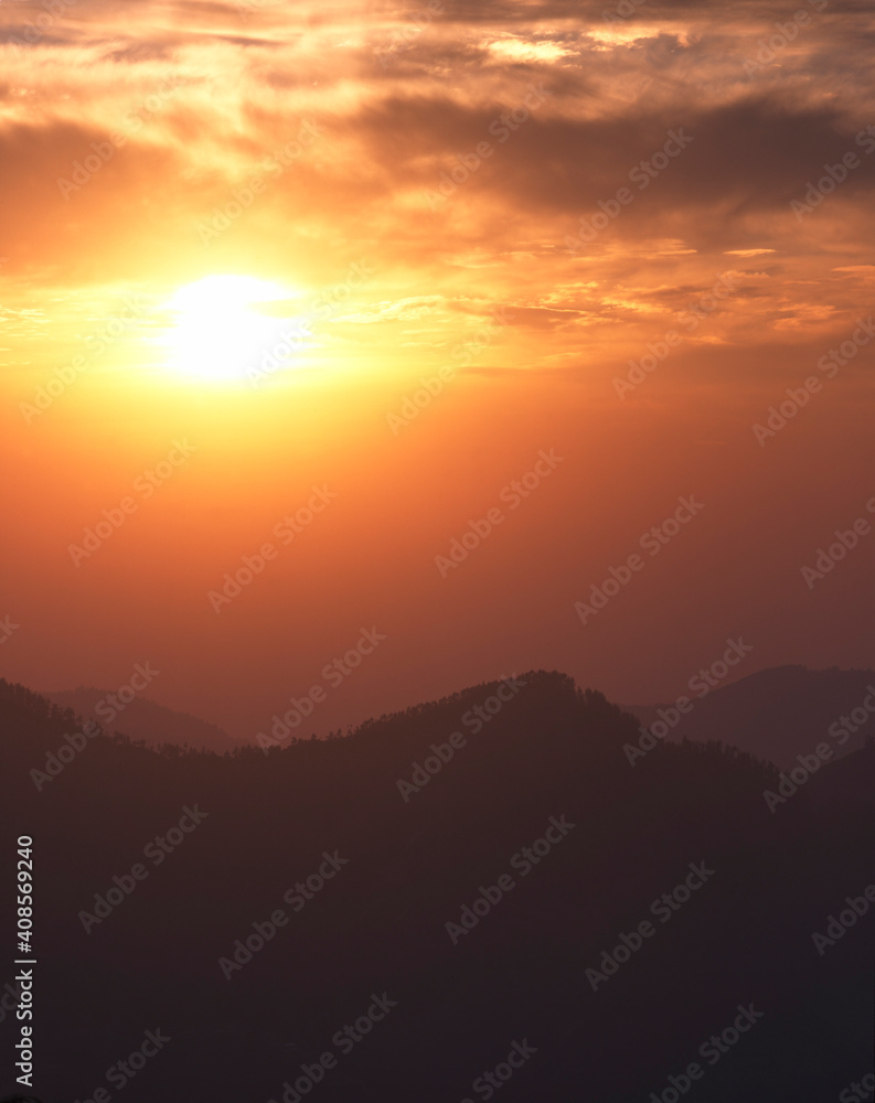 Sunset over over the foot hills of the Himalayas.