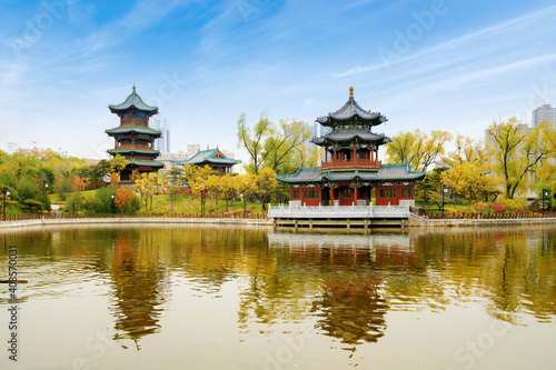 In autumn, ancient buildings and arch bridges are in Yingze Park, Taiyuan, Shanxi Province, China photo