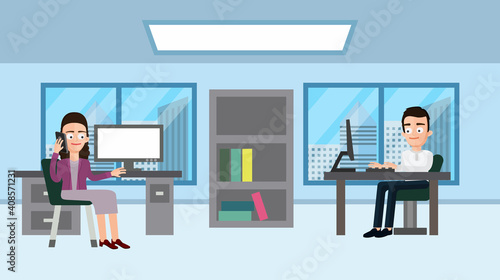 People working in the office, the guys are sitting at their jobs.