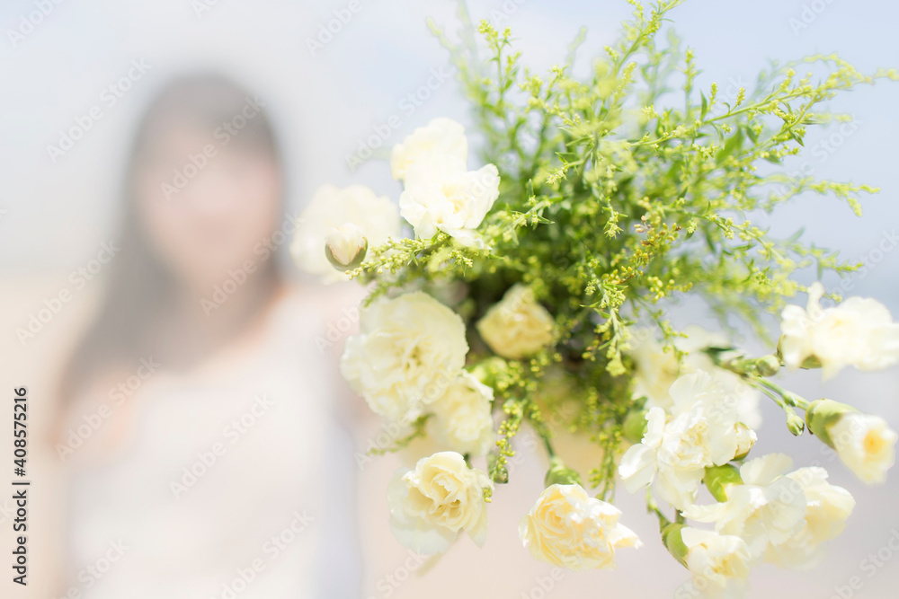 blooming bouquet with blurred bride background