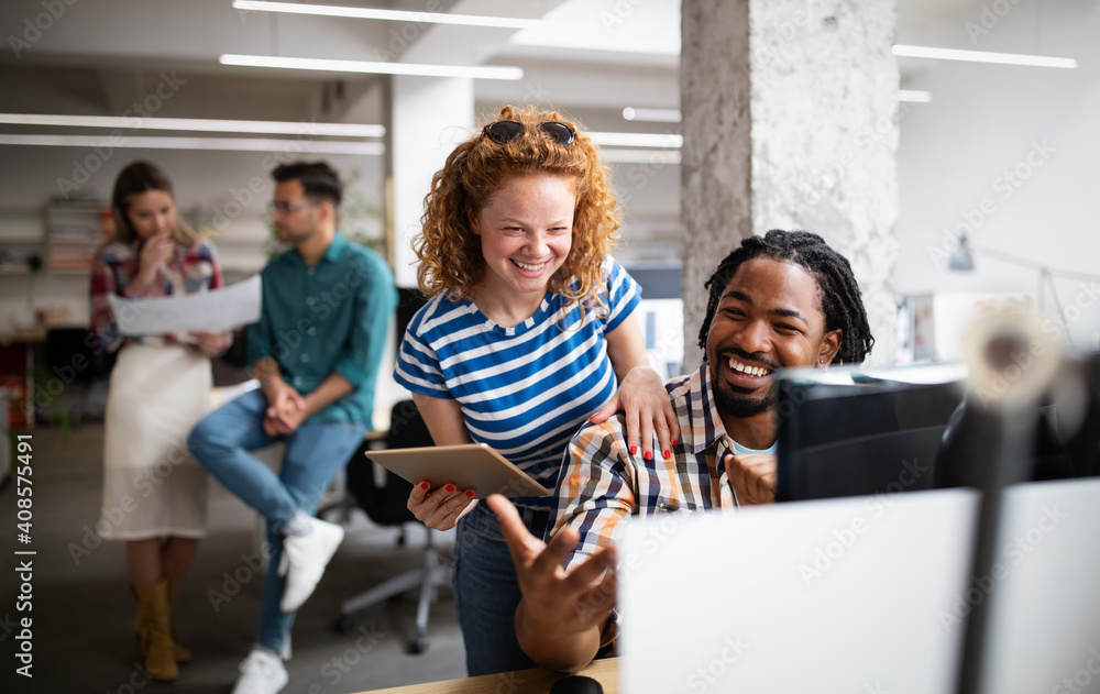 Group of business people and software developers working as a team in office Group of business people and software developers working as a team in office