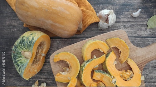 Cutting a pumpkin at home photo