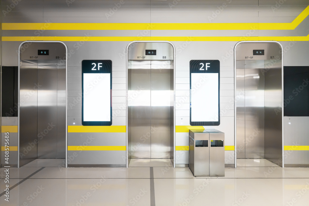 The elevator entrance is in the shopping mall The elevator entrance is in the shopping mall
