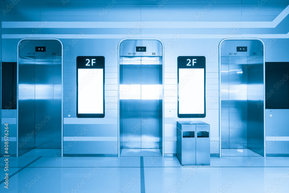 The elevator entrance is in the shopping mall