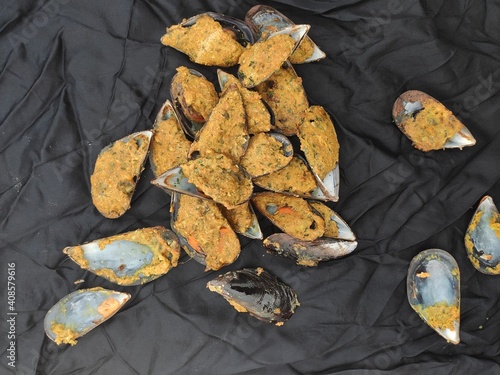 Mussels on  a black tablecloth