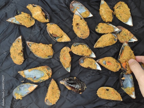 Mussels on  a black tablecloth
