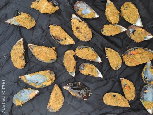 Mussels on  a black tablecloth