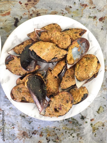 Mussels bowl on white baking paper