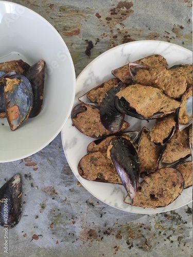 Mussels bowl on white baking paper