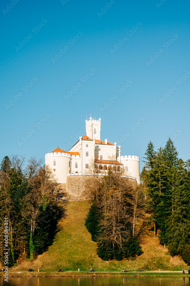 Trakoscan castle in Croatia, Zagorje region. Castle is surrounded by a beautiful lake and forest.