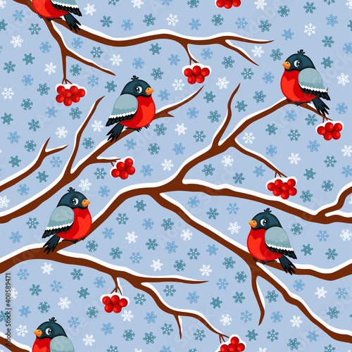 Winter theme seamless pattern with bullfinches, rowan berries and snowflakes. Vector illustration.