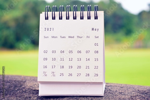 February 2021 white calendar with green background. 2021 new year concept