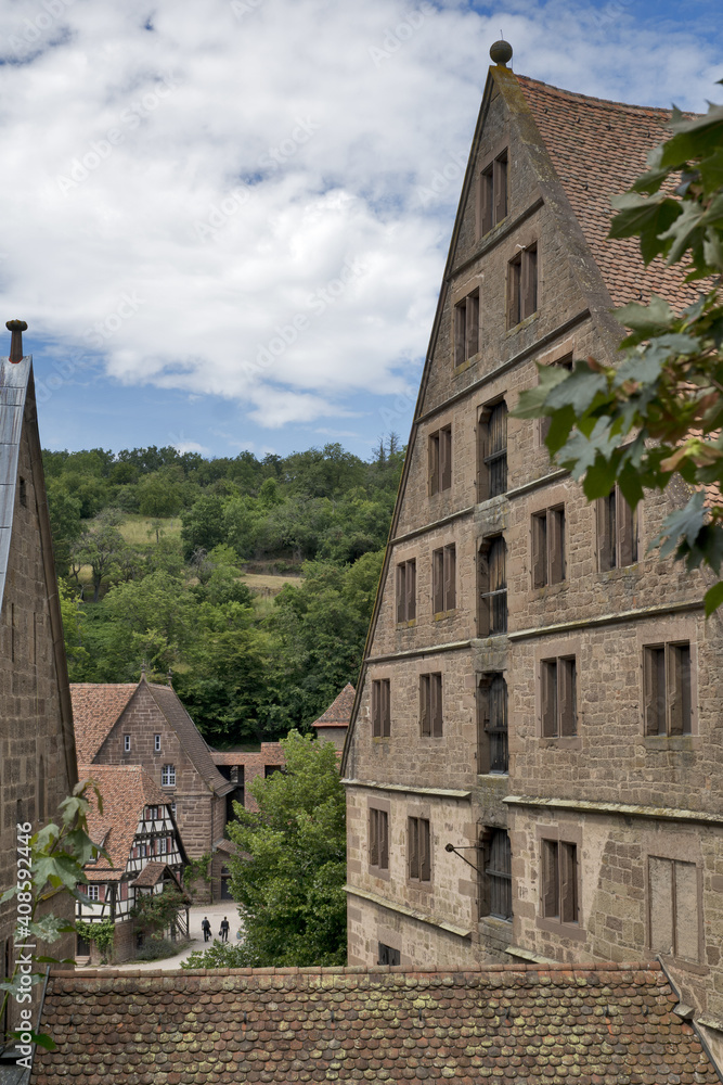 Fototapeta premium Maulbronn Monastery from outside, Germany: is a former Cistercian abbey, one of the best-preserved in Europe, was named a UNESCO World Heritage Site in 1993.