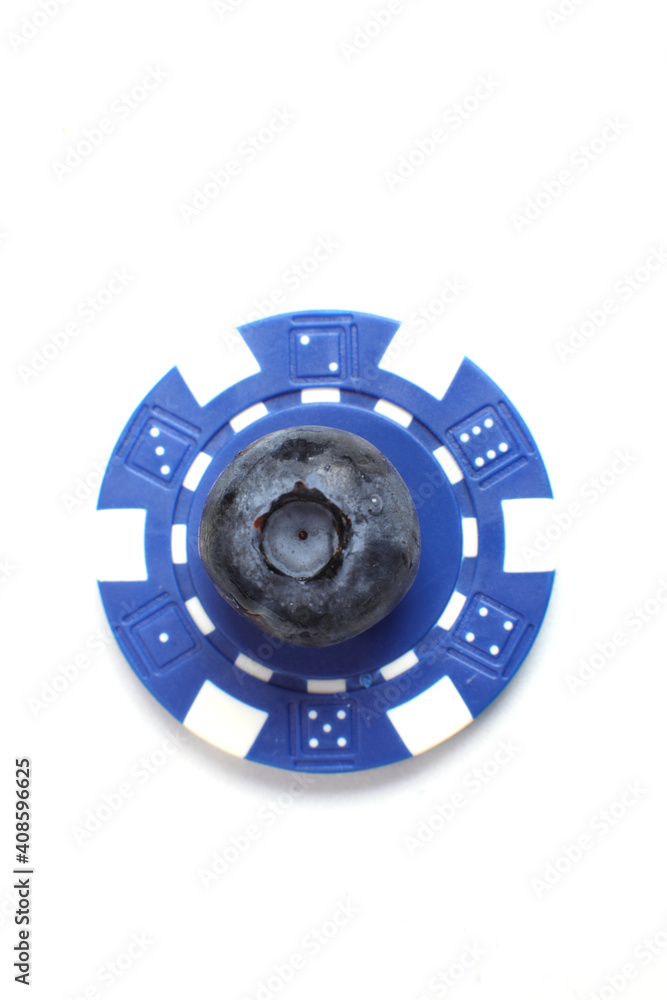 custom made wallpaper toronto digitalTop view of a blueberry and poker chip isolated on a white background.