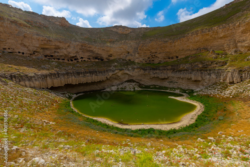 Cirali Pothole is in Akviran Plateau in the north west of Yenikent District of Konya's Karapınar district. photo