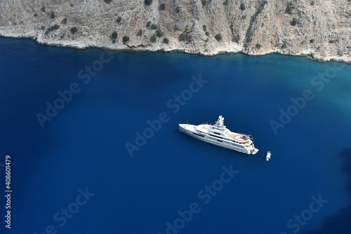 Luxury charter yacht in Butterfly Valley sea bay © Oleksandr