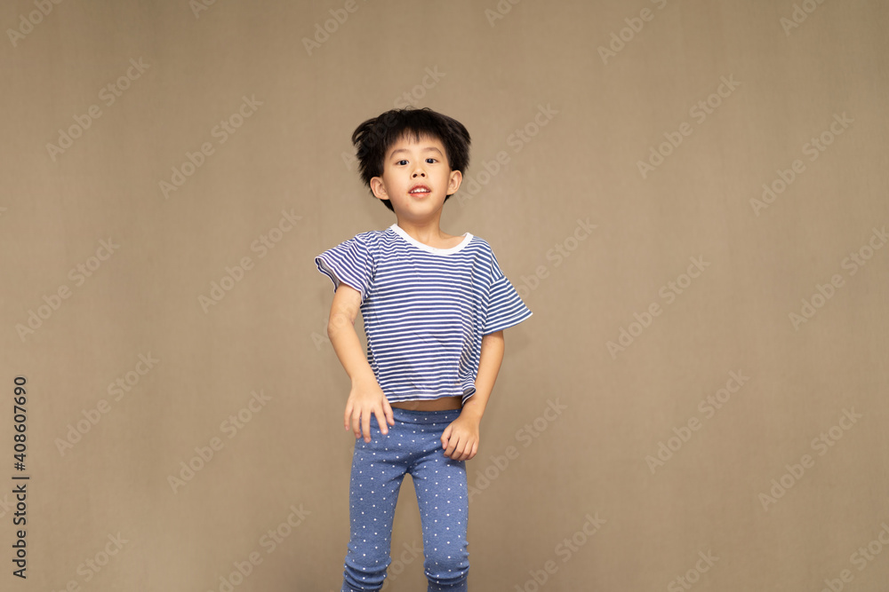 The boy is jumping on the bed. The boy is jumping on the bed.