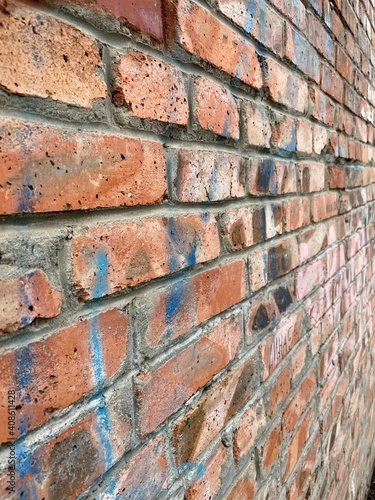 Abstract background texture. Red, orange, brown seamless pattern. Wallpaper design, grunge old surface. Brick wall