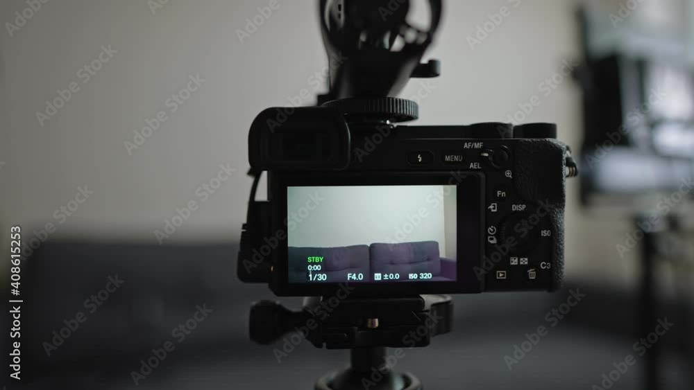 Video camera and light at home. Vlog concept. Video camera and light at home. Vlog concept.