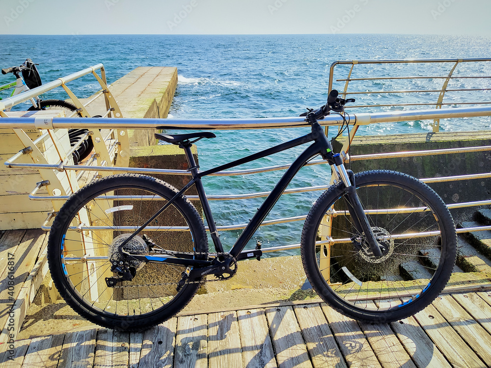 bike by the river with handrails by the sea in sunny weather bike by the river with handrails by the sea in sunny weather