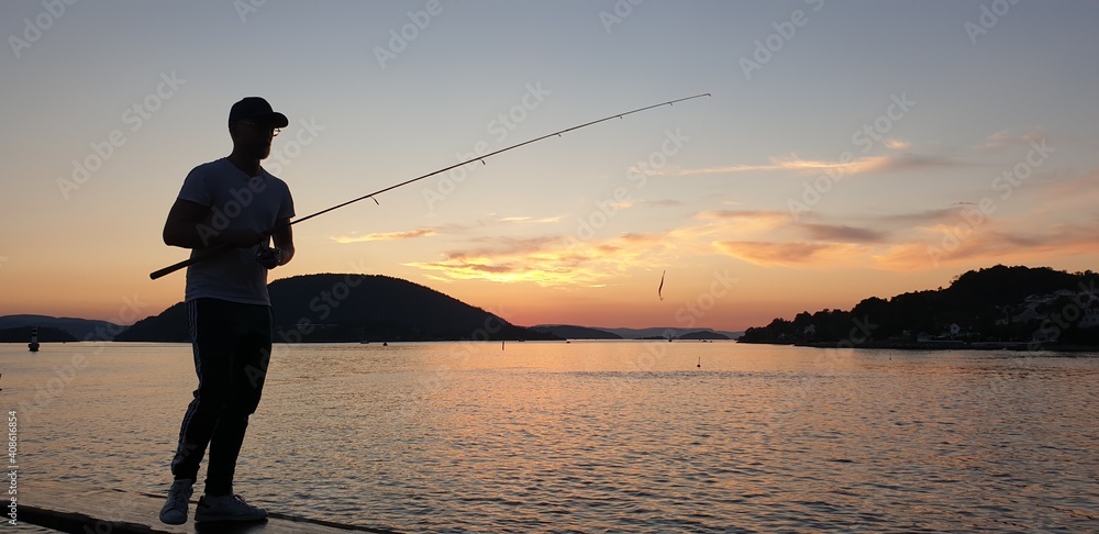 Fisherman at the dusk in Norway Fisherman at the dusk in Norway