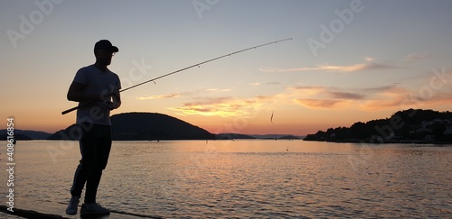 Fisherman at the dusk in Norway © Jarle