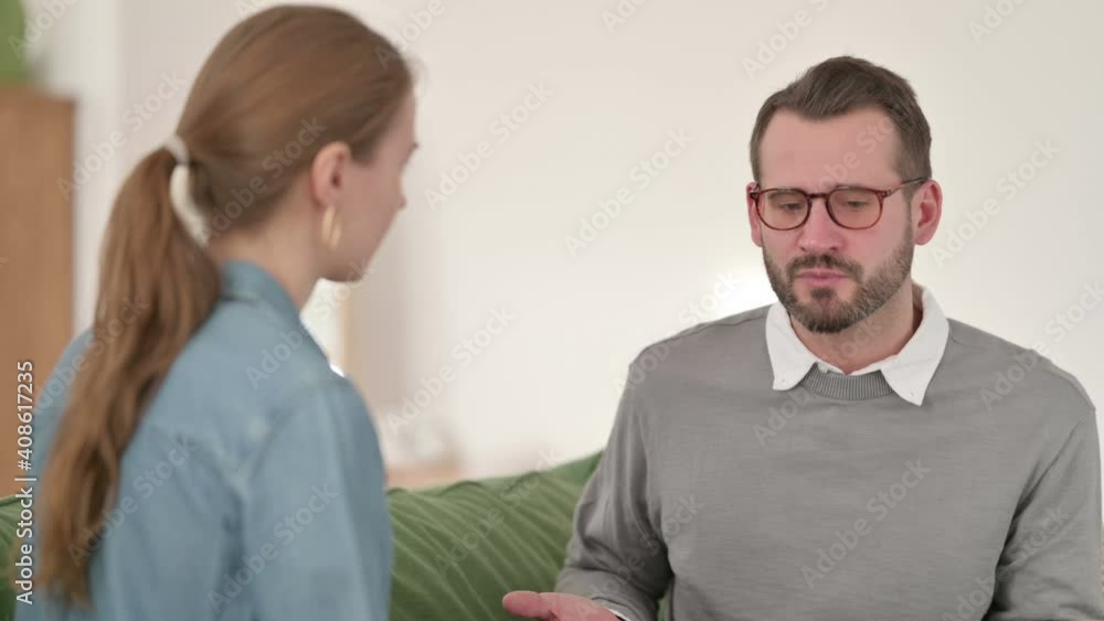 Man Arguing with Woman While Sitting on Sofa, Fighting Man Arguing with Woman While Sitting on Sofa, Fighting