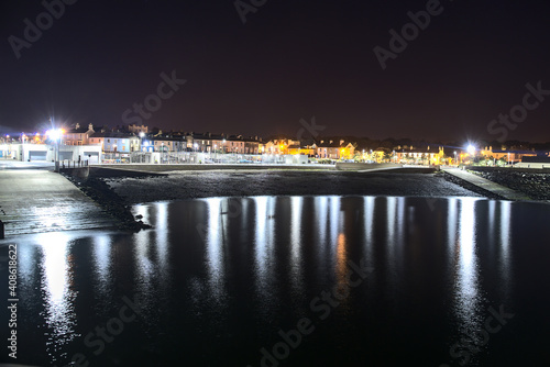 Obraz na plátně Beautiful night view of Greystones Harbour Marina with light reflection in the water, Greystones, Co