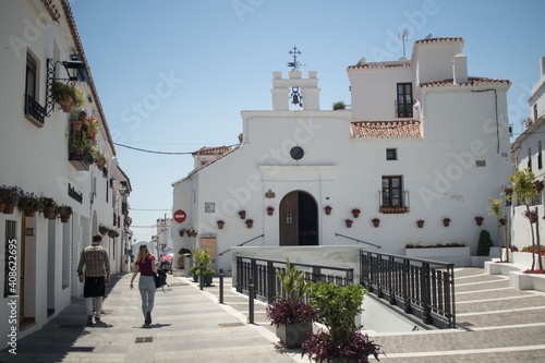 Beautiful white church in Mijas, bright sunny day