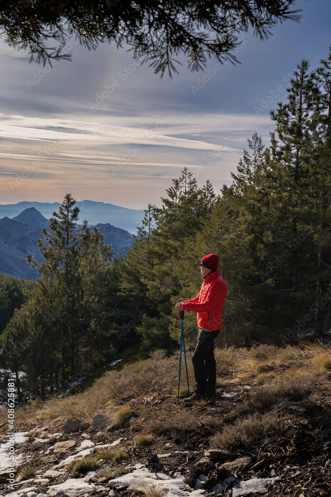 young man hiking in the mountains