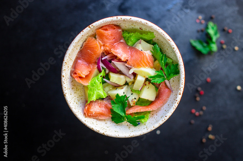 salmon fish seafood salad vegetables lettuce potato ready to eat on the table for healthy meal snack outdoor top view copy space for text food background rustic keto or paleo diet pescetarian