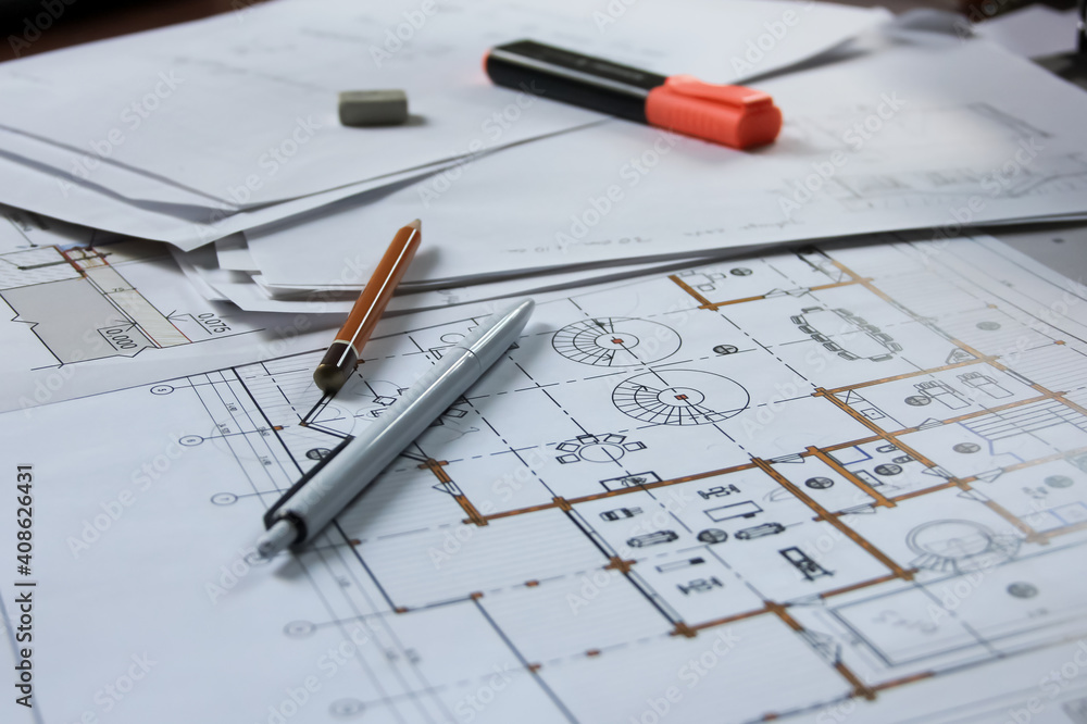 architectural plan with stationery on the table architectural plan with stationery on the table