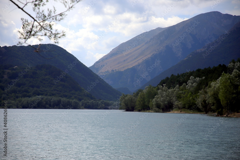 View of the Barrea lake set in the chain of mountains in the background, Barrea, Abruzzo National Park, Italy