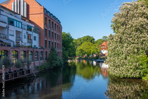 View of historic buildings on the Elster river in Leipzig's scene district Schleussig, Leipzig, Germany