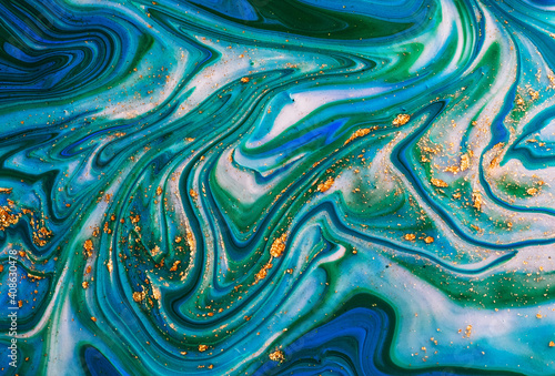 Acrylic abstract blue green background.Fluid art tidewater green toned.