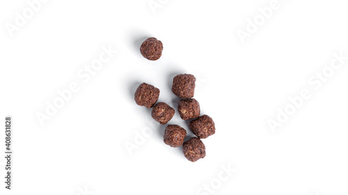 Chocolate balls isolated on a white background. Quick breakfast.