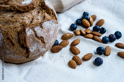 Canvas Print rustic bread with almonds and blueberries