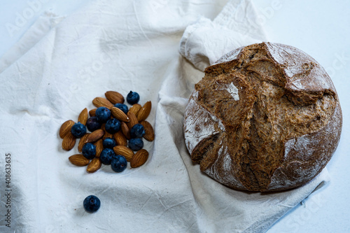 Bilde på lerret rustic bread with almonds and blueberries