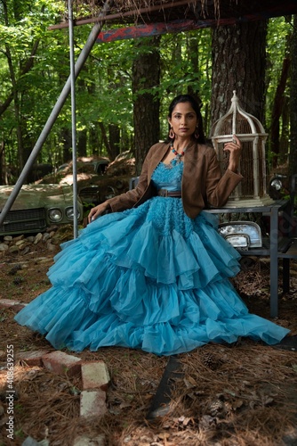 Beautiful Asian Indian woman in fashion shoot on location.