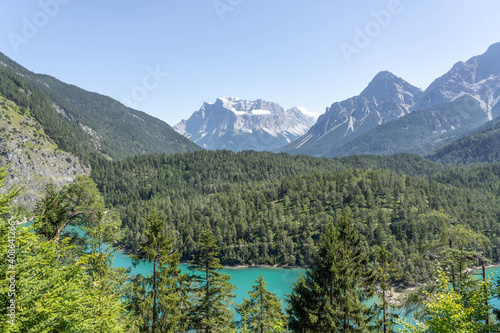 West side view of snowy Zugspitze from Fernpass Austria Blindsee lake © Davidzfr
