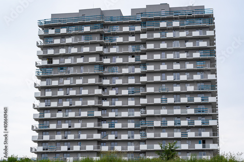 Isolated tall apartment block.