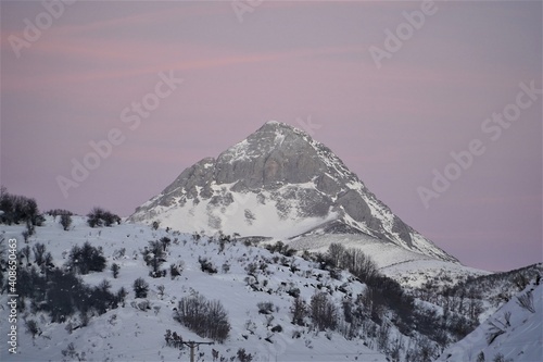 Pico Espiguete while sunset with snow