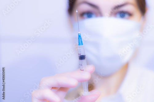 Doctor filling syringe with medication Vaccination coronavirus