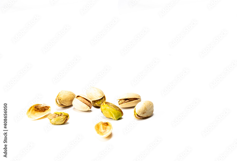 Close up of pistachios on a white background Close up of pistachios on a white background