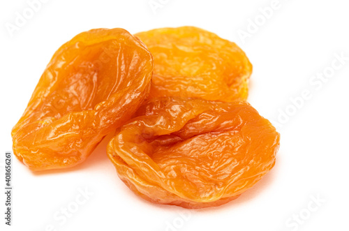 Appetizing natural dried apricots on a white background. Natural sweets, children's joy and health