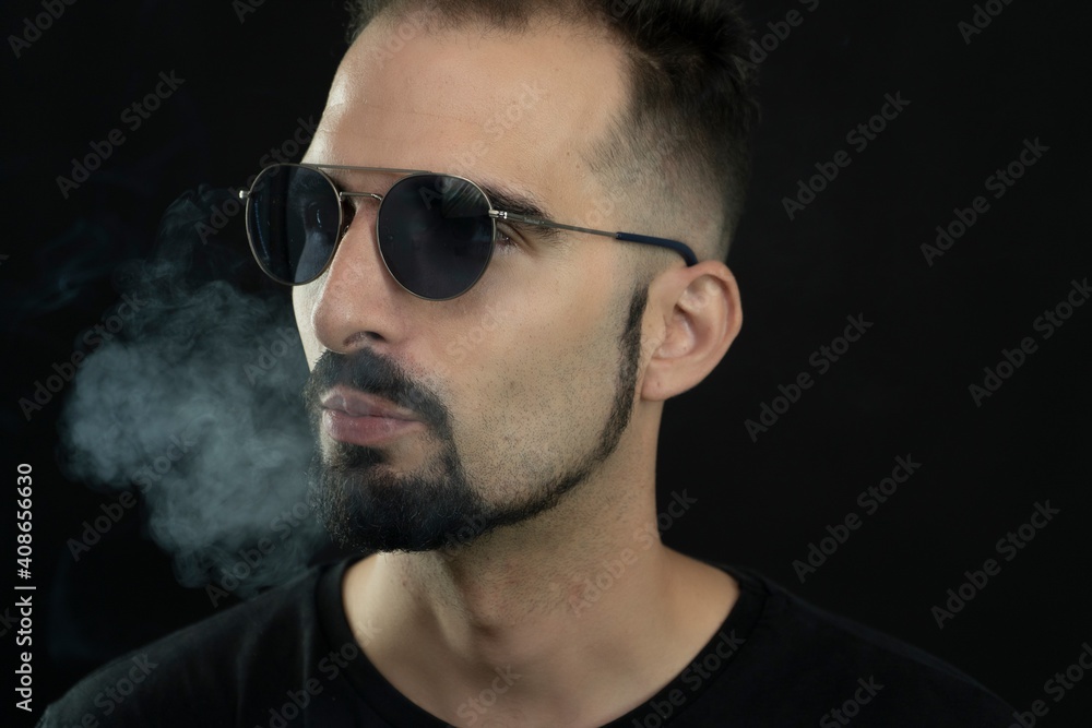 man smoking cigarette man smoking cigarette