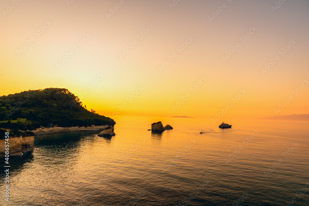 Golden sunset over Corfu Island, Sidari, Rocks of Canal d'Amour Golden sunset over Corfu Island, Sidari, Rocks of Canal d'Amour