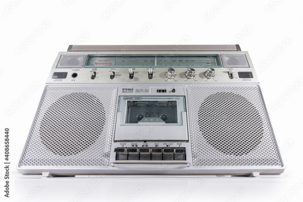 Old boom box AM FM radio, and cassette tape player portable stereo on white. Old boom box AM FM radio, and cassette tape player portable stereo on white.