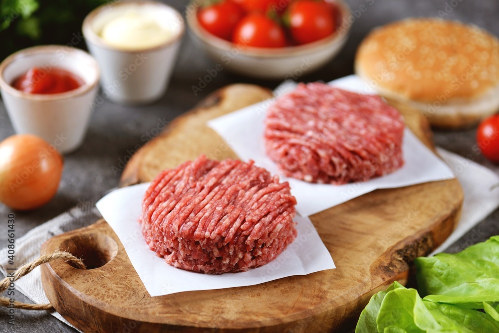 Fresh minced beef ready to cook cutlets. Fresh minced beef ready to cook cutlets.
